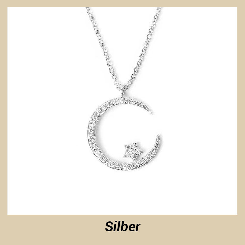 Collar brillante con luna y estrellas.