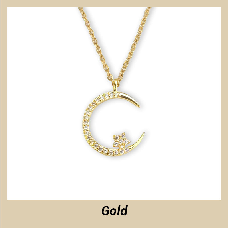 Collar brillante con luna y estrellas.
